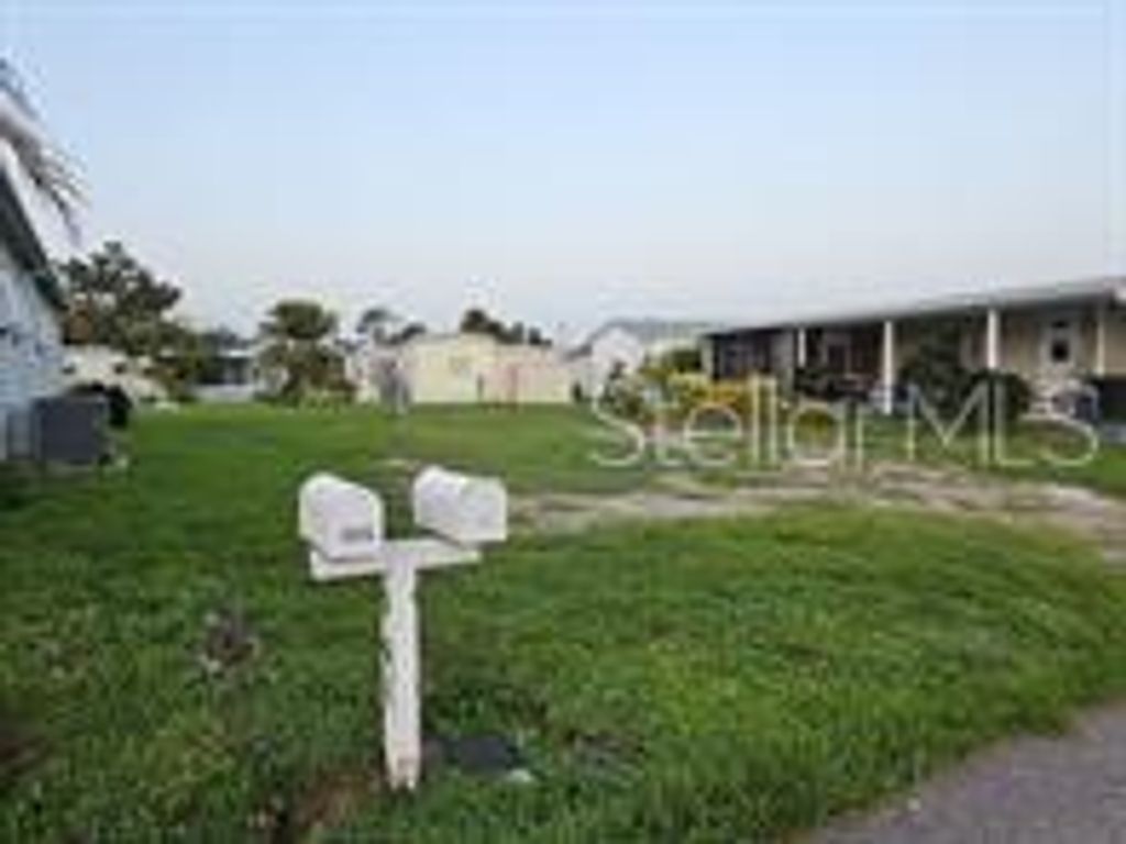 Photo of 5672 Holiday Park Boulevard, North Port, FL 34287 (MLS # C7508200)