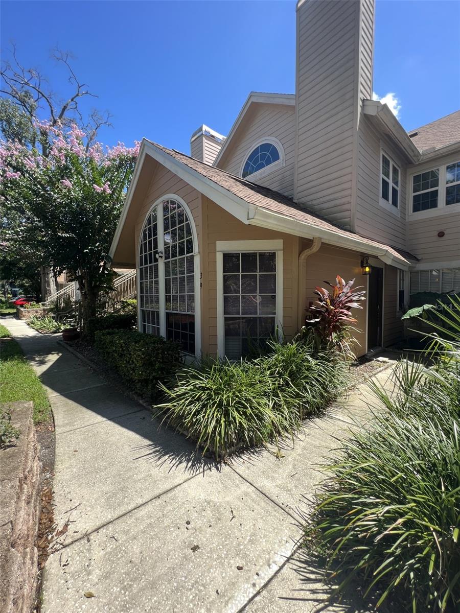 Look no further, in a prime location located at the Hidden Springs Condos in Altamonte Springs, this gorgeous first-floor, two-bedroom, two-bathroom move-in ready. This floor plan is completely spacious and offers lots of natural lighting, vaulted ceilings, and an outdoor porch for extra pleasure. The dining nook and fireplace offer a nice touch making this place feel just right for the right tenant. The condo has new tiles in the kitchen and bathrooms, and Brazilian Koa wood floors in the living area and bedrooms. The appliances are newer and were taken well care of along with the washer and dryer unit. The Community amenities include 2 swimming pools with a hot tub, a fitness center, tennis and racquetball courts, a car washing area, RV and boat parking, and an onsite property manager. Excellent location, great schools, within shaded walking distance/ 1 mile to Merrill Park, restaurants, Publix grocery store, other shopping plazas, Ice cream shops, and public transportation. Also nearby, are the Altamonte Mall, Cranes Roost Park, and Uptown Altamonte. Altamonte Springs is at its best and growing. Scheduled your tour today!
