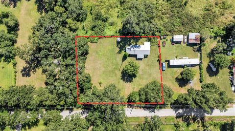 Photo of 12941 Simpson Road, Dover, FL 33527 (MLS # L4956650) Photo of 12941 Simpson Road, Dover, FL 33527 (MLS # L4956650)