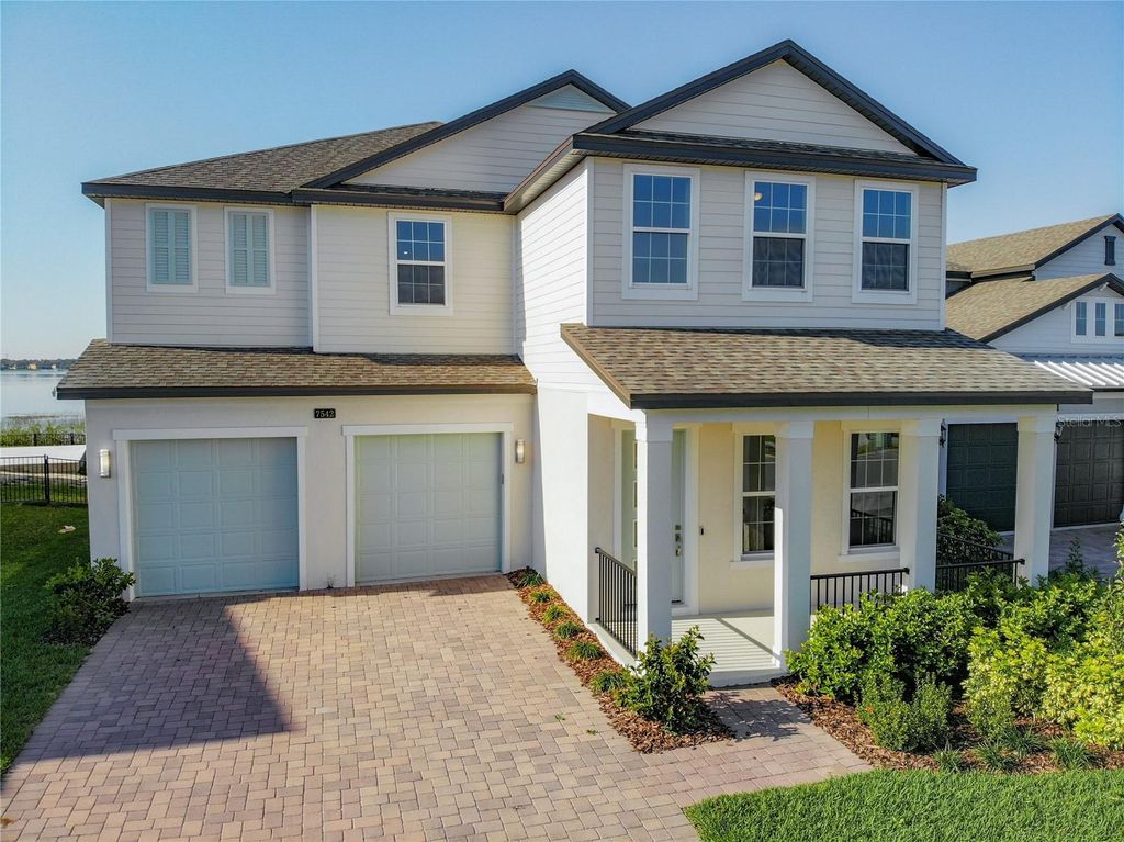 Photo of 7542 Alpine Butterfly Lane, Orlando, FL 32819 (MLS # O6398651)