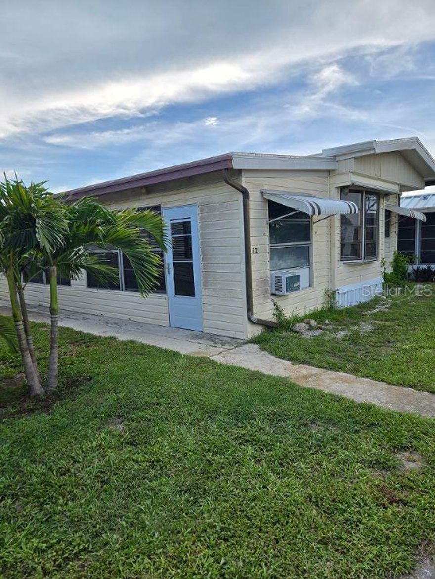 When you move into this home you will be living in resort style community.  There is a very active club house that holds dinners, dances and many other activities.  You will be able to enjoy a swim in the pool, a game of bocci ball or challenge someone to a shuffleboard or maybe a game of horseshoes.  If you like sand the Gulf of America is only a couple of miles away on Manasota Key.  Many stores and shops are close by.  There are many large and small restaurants close by.  Englewood Community Hospital and doctors within 3 miles.  Now if you like to fish,  boat or play golf you will be in the center of activity.  This park model has a new roof and may be your new vacation or permanent home.