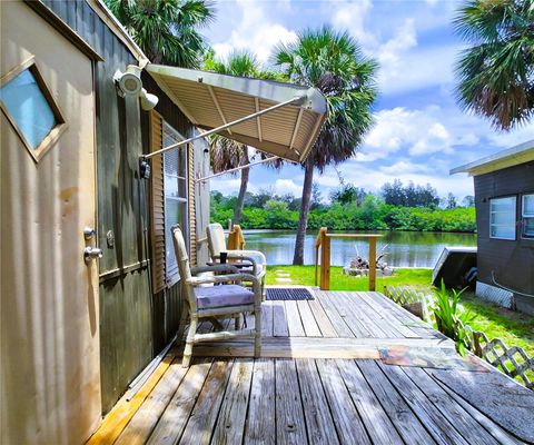 Photo of 6975 Edgewater Drive, New Port Richey, FL 34652 (MLS # TB8405799)