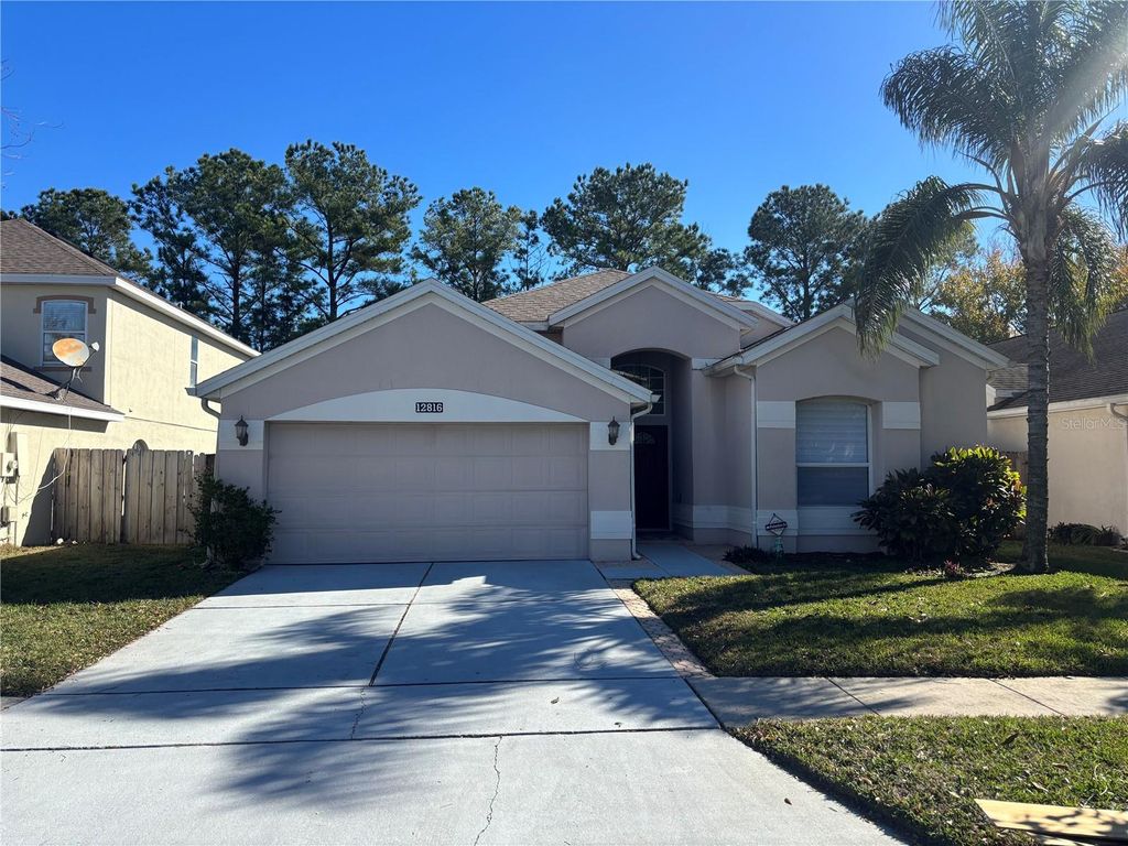 Photo of 12816 Maribou Circle, Orlando, FL 32828 (MLS # O6376240)