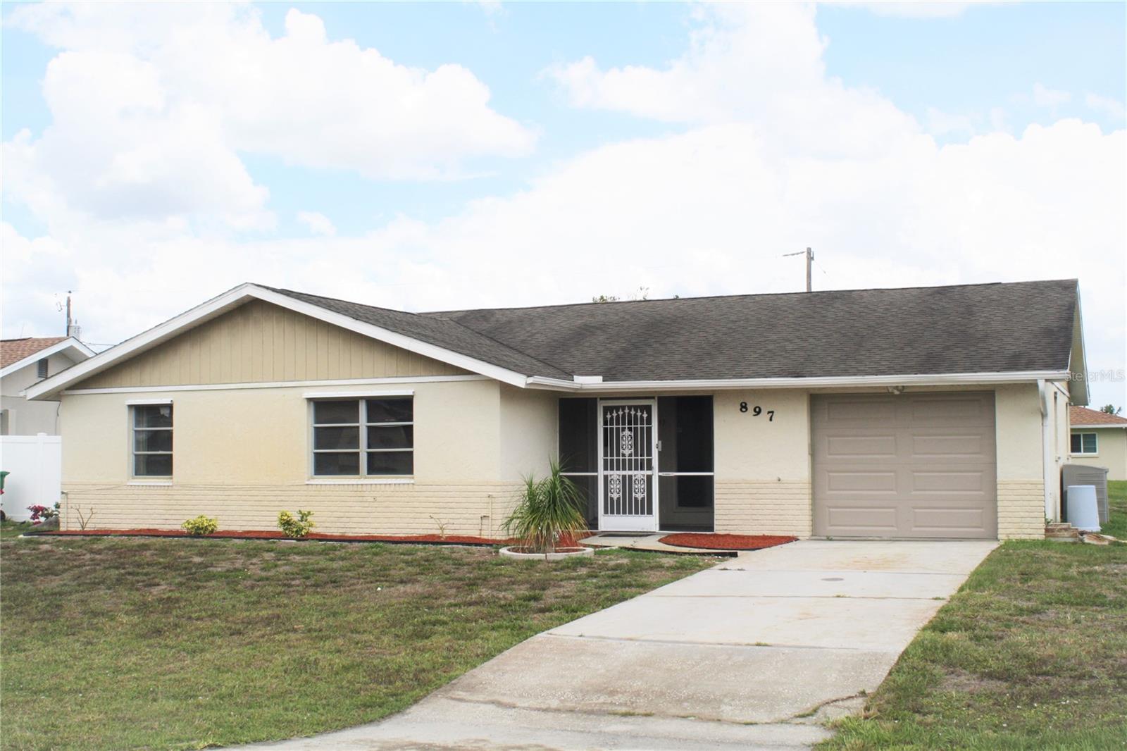 Large corner property in popular Port Charlotte neighborhood. Move in ready with updated flooring throughout and updated master bath with walk in shower. Large enclosed and air-conditioned lanai makes for a great family room. Inside laundry room is large and has lots of built in storage. Septic recently pumped and inspected. Wind Mitigation and Four Point inspections done just prior to Hurricane Ian. Conveniently located close to shopping, schools, boat ramps, parks, and with easy access to US-41