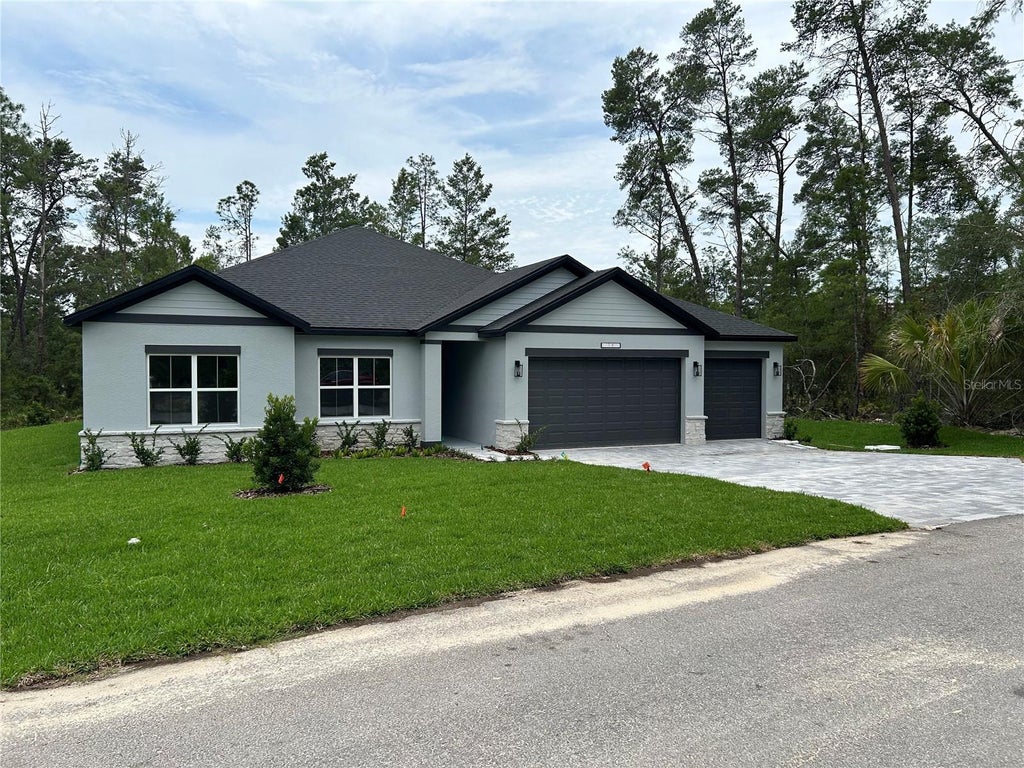 Photo of 12437 Harris Hawk Road, Brooksville, FL 34614 (MLS # P4939880)