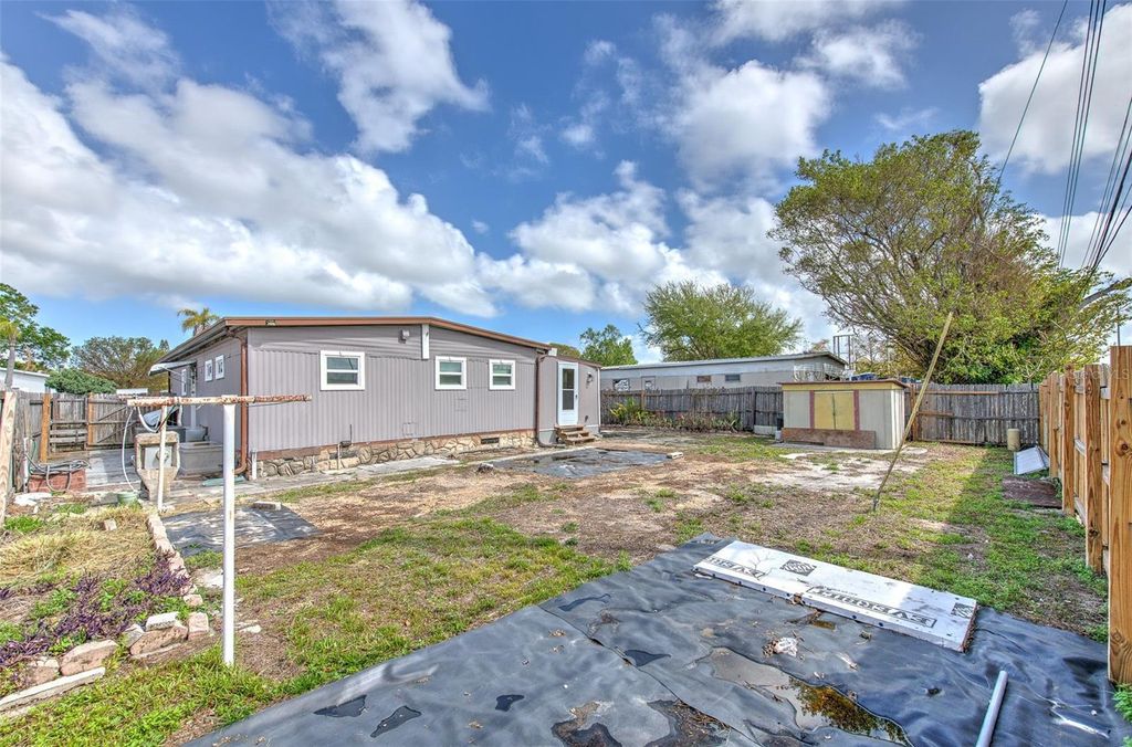 Photo of 6028 136th Avenue N, Clearwater, FL 33760 (MLS # TB8484608)