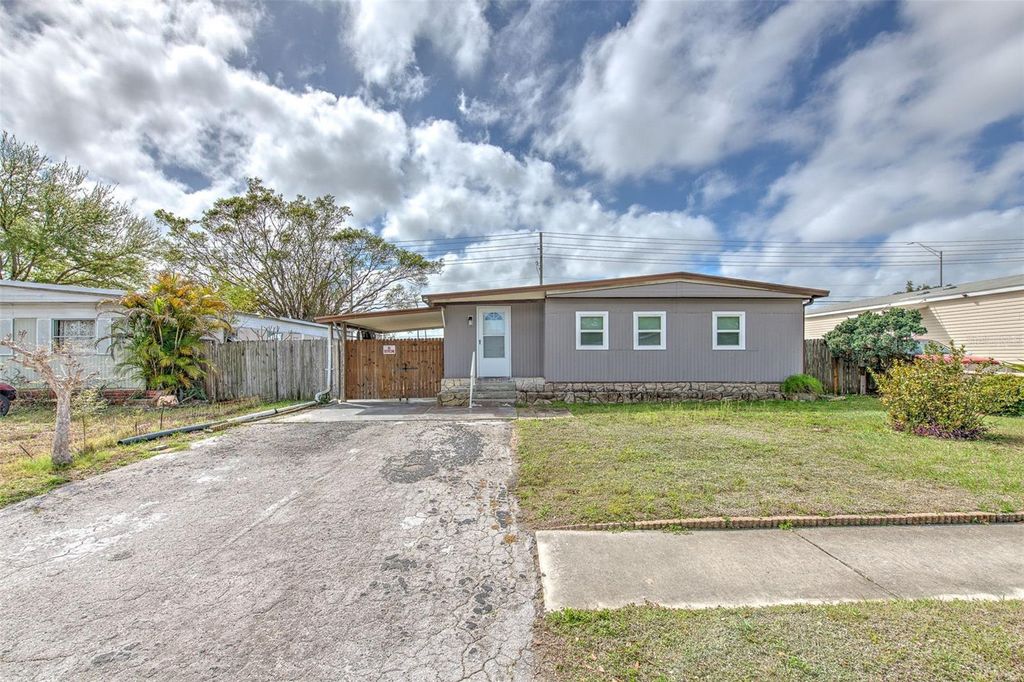 Photo of 6028 136th Avenue N, Clearwater, FL 33760 (MLS # TB8484608)
