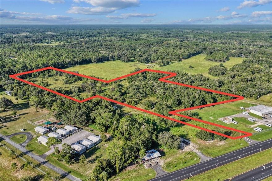 17.69 acres of opportunity! Whether you’re looking for space to build or simply invest in Florida land, this is a rare blank canvas ready for your vision. Zoned R-2 Residential Multi-Family, the parcel offers excellent potential for future development. City water is available, making the property even more attractive for building opportunities. With its generous size and peaceful surroundings, the land provides the perfect balance of seclusion and accessibility. Located along NE Hwy 27 Alternate with convenient access to Gainesville, Ocala, and just 30 minutes from Cedar Key, the property is well-positioned for long-term growth. Few properties combine size, location, and versatility like this…don’t miss out!