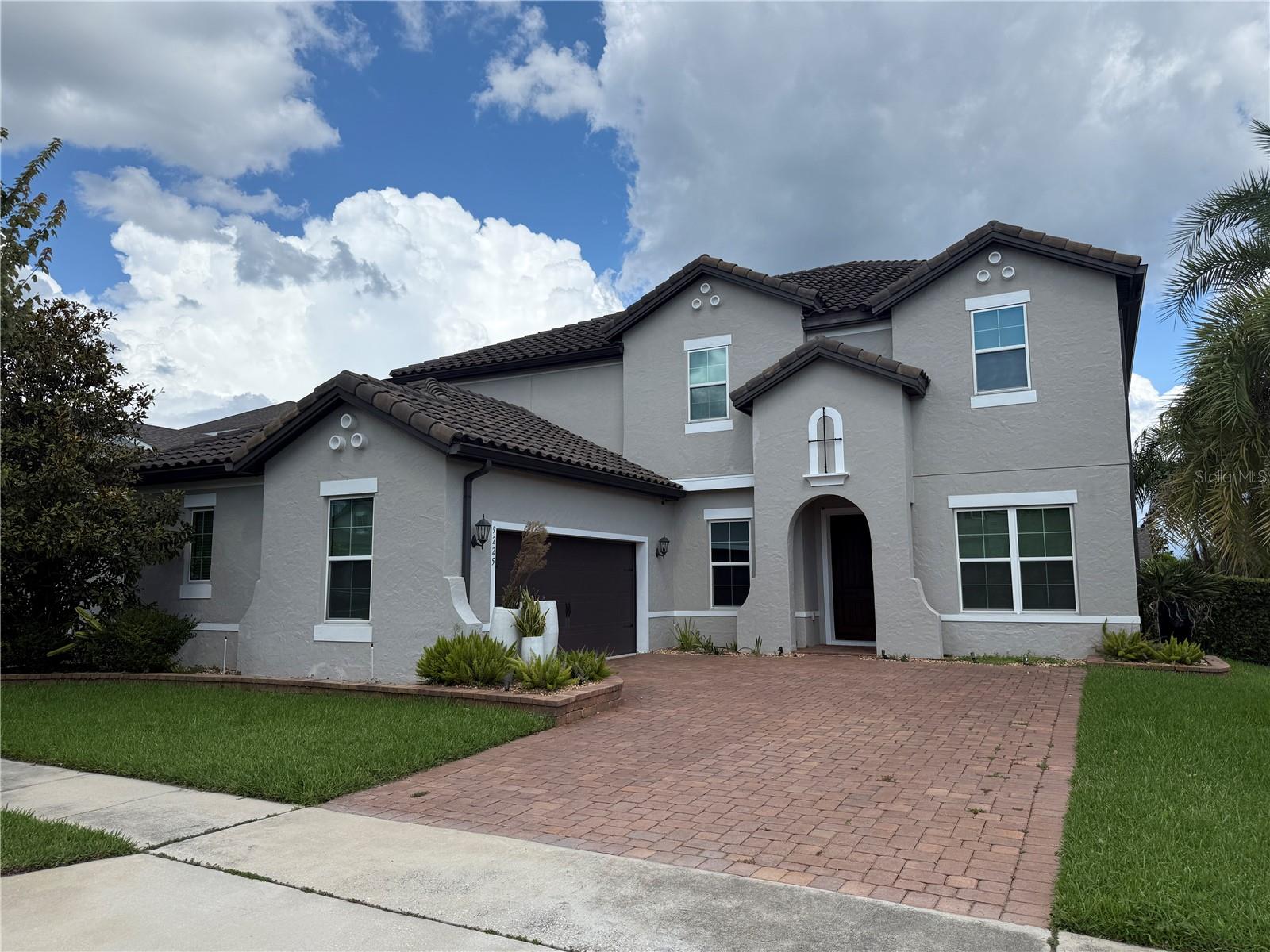 Welcome to Your Dream Home in the Heart of Winter Garden!
Built by Meritage Homes, this stunning single-family residence perfectly blends elegance, functionality, and resort-style living. Situated on a spacious corner lot, the home boasts upgraded landscaping, custom holiday lighting, and a 2-car side-entry garage for enhanced curb appeal and convenience.
Step inside and prepare to be impressed by the open, inviting floor plan designed for both relaxation and entertaining. At the heart of the home, the chef’s kitchen features an expansive quartz island, upgraded cabinetry, high-end stainless steel appliances, and plenty of prep and storage space. The oversized island doubles as the perfect gathering spot for meals, conversations, and lasting memories with family and friends.
With 5 bedrooms and 4 full bathrooms, this home offers an ideal flexible layout. On the main level, you’ll find a private bedroom and bath, perfect for guests or multi-generational living. Just off the great room, a versatile bonus room provides endless possibilities — ideal for a pool table, home theater, playroom, or additional living space to suit your lifestyle.
Upstairs, you’ll be greeted by a NEW A/C UNIT and thoughtfully designed living spaces. The primary suite is a serene retreat, featuring a spa-inspired ensuite bathroom and a custom walk-in closet designed for ultimate organization. All additional bedrooms include custom built-in closets, and one secondary bedroom boasts its own private ensuite bath for added convenience.
Step outside to your private backyard oasis — complete with a new pool and spa, stunning water bowls, and a travertine patio with a partially covered area perfect for outdoor dining or entertaining. Whether you’re soaking up the Florida sunshine, hosting family barbecues, or enjoying peaceful evenings by the pool, this space was built for making memories.
Perfectly located just minutes from Disney World, you’ll have effortless access to world-class entertainment, shopping, and dining. A brand-new shopping center with a restaurant and coffee shop is just a short walk away, making everyday conveniences easily accessible.
The community amenities are second to none — enjoy a resort-style pool, splash pad, playgrounds, tennis courts, sports courts, and open green spaces for leisurely strolls and family picnics.
This is more than a home — it’s a lifestyle. Don’t miss your chance to own this beautiful Meritage-built retreat in one of Winter Garden’s most sought-after communities. Schedule your private showing today and start living the life you’ve always dreamed of!