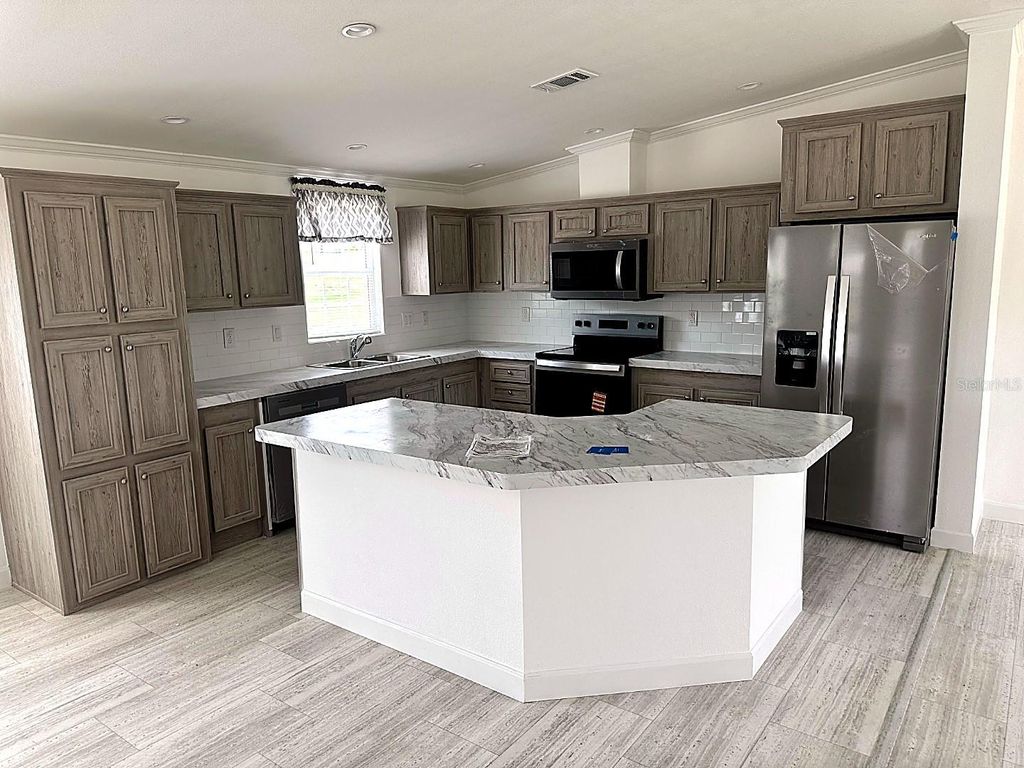 Photo of 3492 Greenbluff Road #1119, Zellwood, FL 32798 (MLS # O6404230)