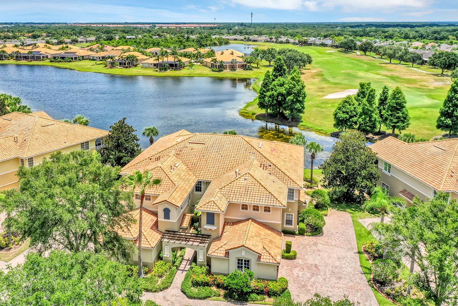 Live the maintenance-free lifestyle you deserve in this spacious 3-bedroom, 2-bath condo in the gated community of Toscana at Renaissance. Nestled on the second floor with a private elevator, this end-unit offers peaceful pond views and over 2,400 square feet of beautifully designed living space. High ceilings, crown molding, and natural light set the tone, while the open layout connects the living, dining, and kitchen areas for seamless everyday living and entertaining.
The kitchen features solid wood cabinetry, granite countertops, a walk-in pantry, and a large island. Enjoy morning coffee on your screened lanai with tranquil water views, or unwind in the oversized primary suite with tray ceilings, a walk-in closet, and a spa-like bath with dual sinks and a frameless glass shower. Two additional bedrooms, a dedicated study, a large laundry room, and a 2-car garage complete the layout.
As a resident of Renaissance, you'll enjoy exclusive access to the Club Renaissance with resort-style amenities including a fitness center, restaurant, pool, spa, and golf. Located near medical centers, shopping, and dining, and just 35 minutes to downtown Tampa.