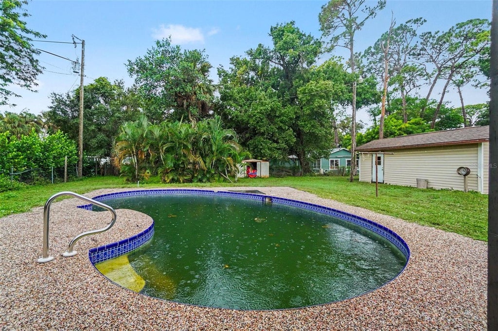 Photo of 1425 Orchid Road, North Fort Myers, FL 33903 (MLS # TB8542714)
