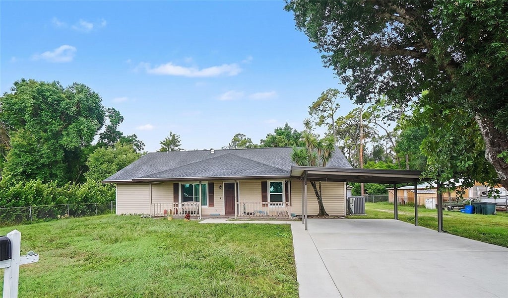 Photo of 1425 Orchid Road, North Fort Myers, FL 33903 (MLS # TB8542714)