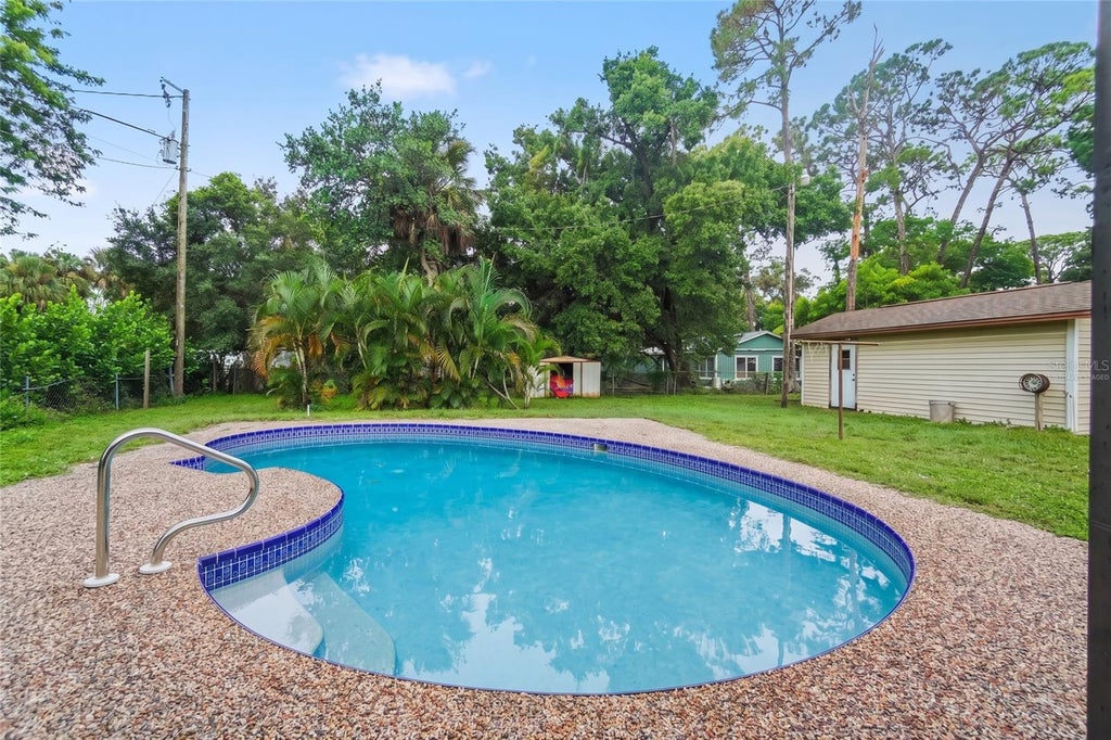 Photo of 1425 Orchid Road, North Fort Myers, FL 33903 (MLS # TB8542714)