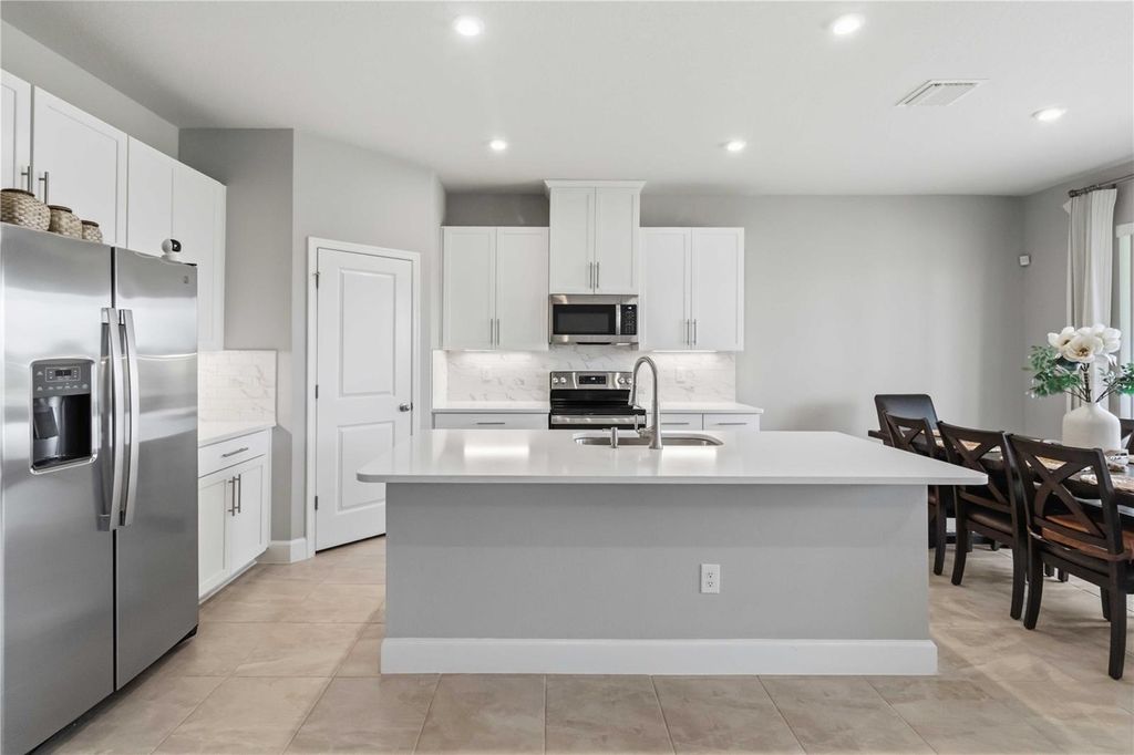 Photo of 10009 Daybreak Glen, Parrish, FL 34219 (MLS # C7526289)