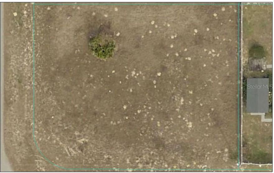 Lovely cleared corner lot in a great southwest subdivision. Close to supermarket, businesses, schools, hwys 484, 200, and I-75,   No time limit to build on. Great for investment or build your dream home. Must See it!