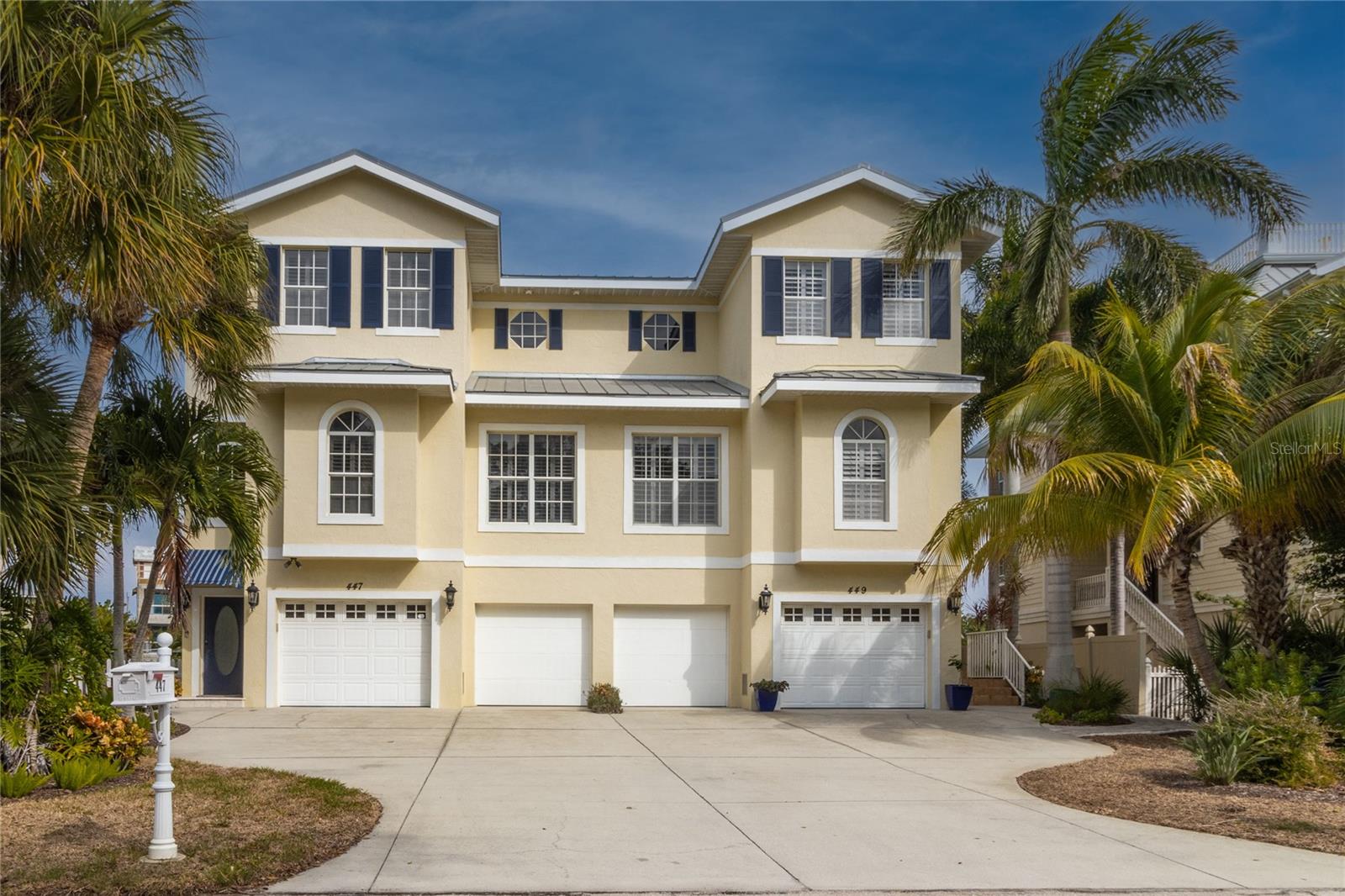 Welcome to Grand Siesta! Rarely available Opportunity!
Where else on Siesta Key can you find this unique location, offering Siesta Beach Access a block away, the Siesta Village two blocks away, directly on the Grand Canal with a boat lift, while all within the weekly rental zone.
Paradise awaits at this fabulous, 3 bedroom/3.5 bath luxury townhouse. This amazing, spacious, luxury townhouse draws you in with an inviting, professionally designed interior with a comfortable, coastal vibe. The concrete block exterior provides structural integrity. An excellent space for entertaining family & friends in your custom gourmet kitchen with gas range and open-concept living area with magnificent views. This truly extraordinary property boasts: 10 ft. ceilings, custom window treatments, Thermador appliances, porcelain tile, hardwood flooring, granite countertops, custom cabinetry, elevator service to all floors, as well as other high-end finishes. Enjoy sweeping views of the Grand Canal & fabulous sunrises from your living area & covered porches as well as the exquisite, primary suite. A boater’s dream house…water fun is guaranteed with a private, heated, saltwater pool, dock with power & water, and a 10,000 lb. boat lift. View playful manatees, jumping fish, and colorful sea birds from the covered porches. A two-car garage is a rare feature for a beach retreat. Enjoy an early morning walk or bike ride on the beach, take a quiet kayak ride or paddle board in the canals or on the beach, watch the beautiful sunrises on your covered porch, or just relax in your private pool. Perfectly located on the Grand Canal, while just one block to the powdery, crystal sands & turquoise waters of Siesta Key Beach. You’ll love strolling to the Iconic, Siesta Village where you’ll enjoy a variety of restaurants, live music, dancing, shopping or just sipping margaritas at happy hour. It’s the perfect trifecta for location. When not using as your own personal retreat, the weekly rental opportunity can generate income to offset expenses. This coastal sanctuary offers an unsurpassed lifestyle for anyone looking for their own piece of Island Paradise! Considered the cultural gem of Florida’s West Coast, you’ll be only 5 miles from wonderful cultural and social activities in Downtown Sarasota. You’ll fall in love with this exquisite , tranquil, Canal Front Property on Siesta Key whether it’s your winter escape, family getaway, or permanent residence. Embrace Your Beach Life! What are you waiting for?