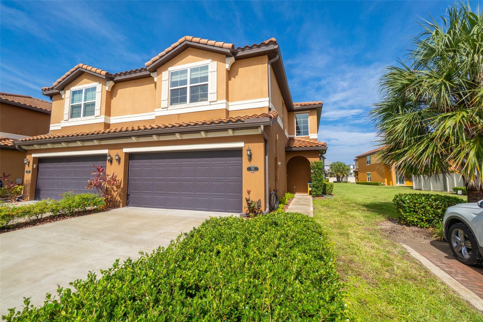 Step into coastal paradise with this stunning, 2020 built end-unit townhome in the exclusive Montecito community. The airy, open floor plan dazzles with a chef's kitchen—custom center island, gleaming granite countertops, chic coastal tile backsplash, stainless appliances & custom pantry. The downstairs primary suite is a retreat with a vast walk-in closet, double-sink granite vanity & luxurious tile shower w/pebble floor. Relax on the screened patio off the living area & enjoy serene pond views from the 2nd floor, while gorgeous light fixtures illuminate the entire home. Upstairs, a vast loft w/generous storage, 2nd bedroom w/dual closets (one walk-in), and 3rd bedroom w/walk-in closet & pond views. The 2-car garage shines with epoxy floors & smart storage solutions. Additional features include impact windows, storm shutters & Aquasana water filter. Montecito's resort-style pool, clubhouse, fitness center, and trails await. Pet-friendly & move-in ready—your dream home is calling!