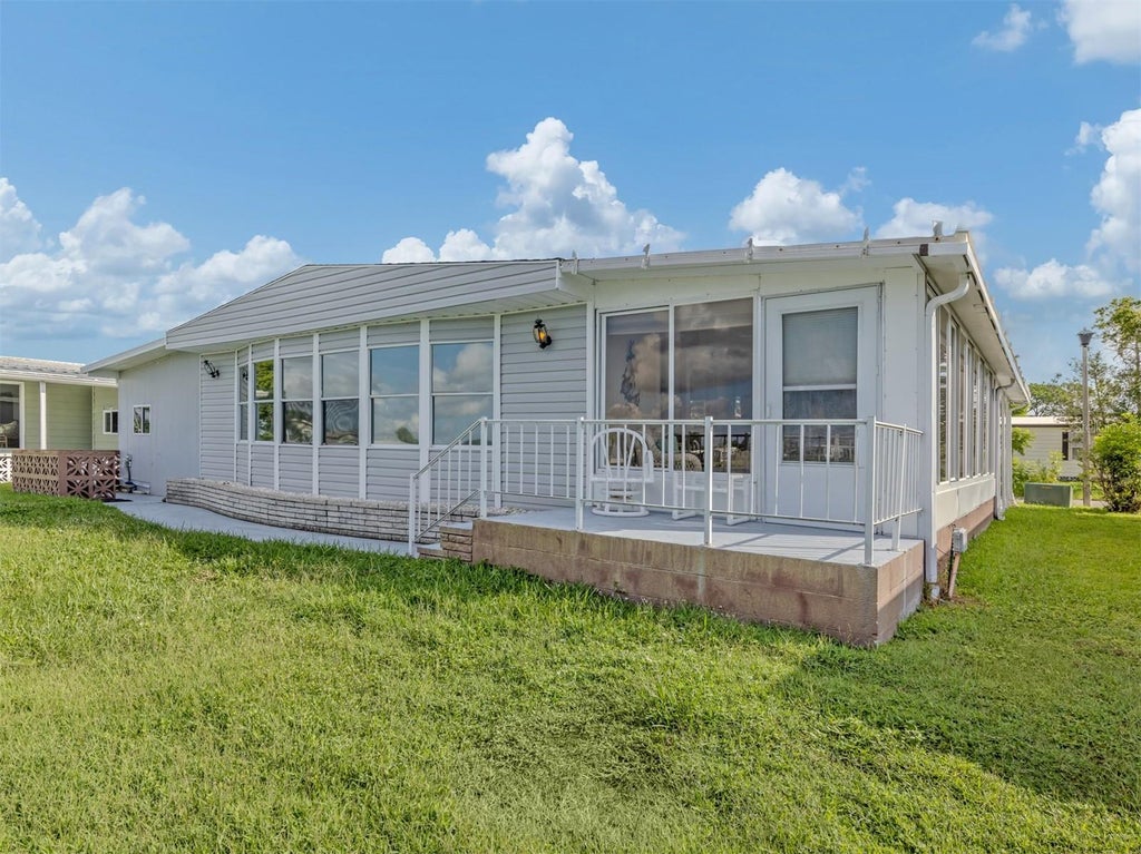 Photo of 97 Lakeview Drive, North Port, FL 34287 (MLS # N6145262)