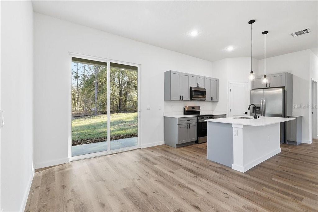 Photo of 8675 N Circular Way, Citrus Springs, FL 34434 (MLS # O6377885)