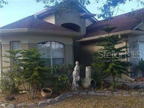 Photo of 11712 Hatcher Circle, Orlando, FL 32824 (MLS # O6421855)