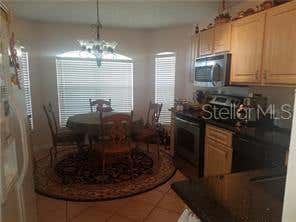 Photo of 11712 Hatcher Circle, Orlando, FL 32824 (MLS # O6421855)