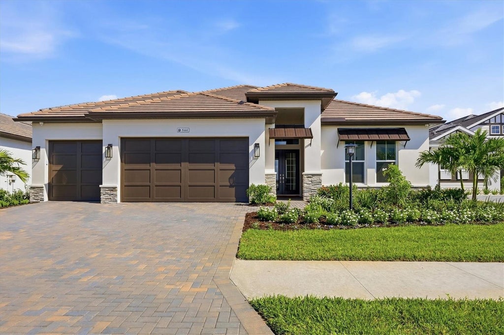 Photo of 844 Blue Shell Loop, Sarasota, FL 34240 (MLS # A4705322)