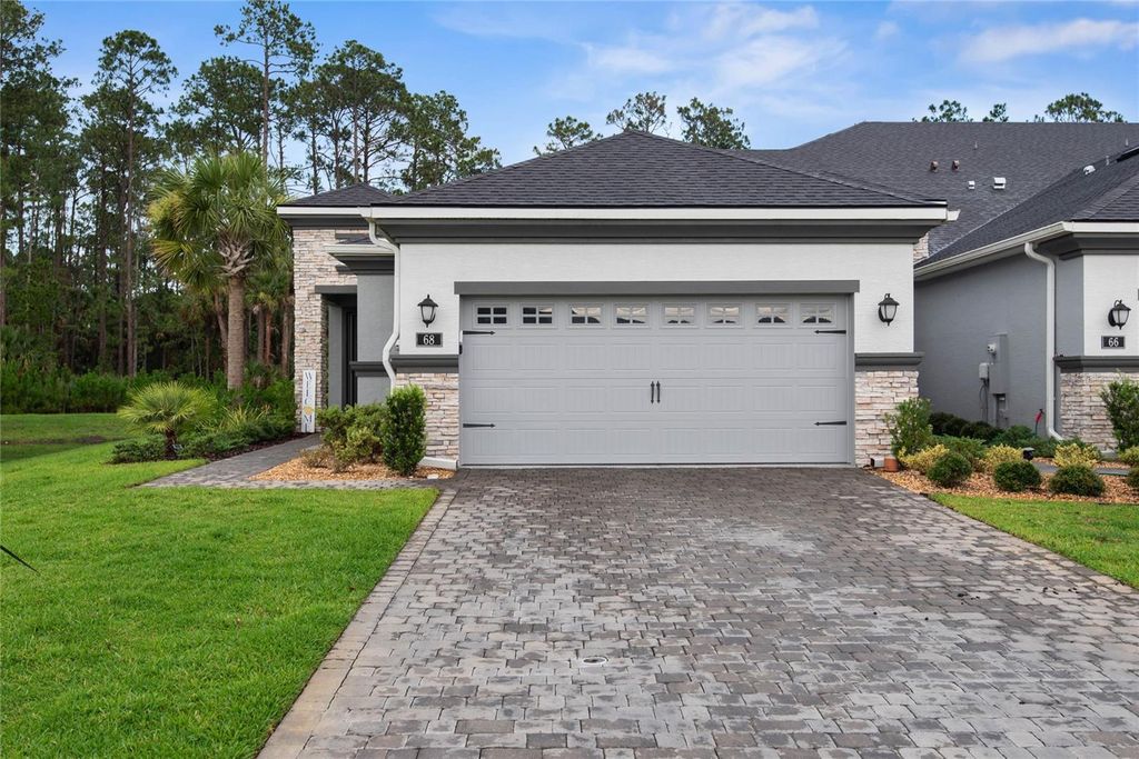Photo of 68 Longridge Lane, Ormond Beach, FL 32174 (MLS # FC310461)