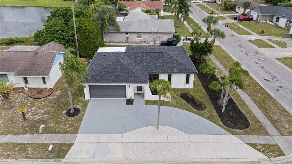 Photo of 1016 Fuchsia Drive, Holiday, FL 34691 (MLS # TB8552589)