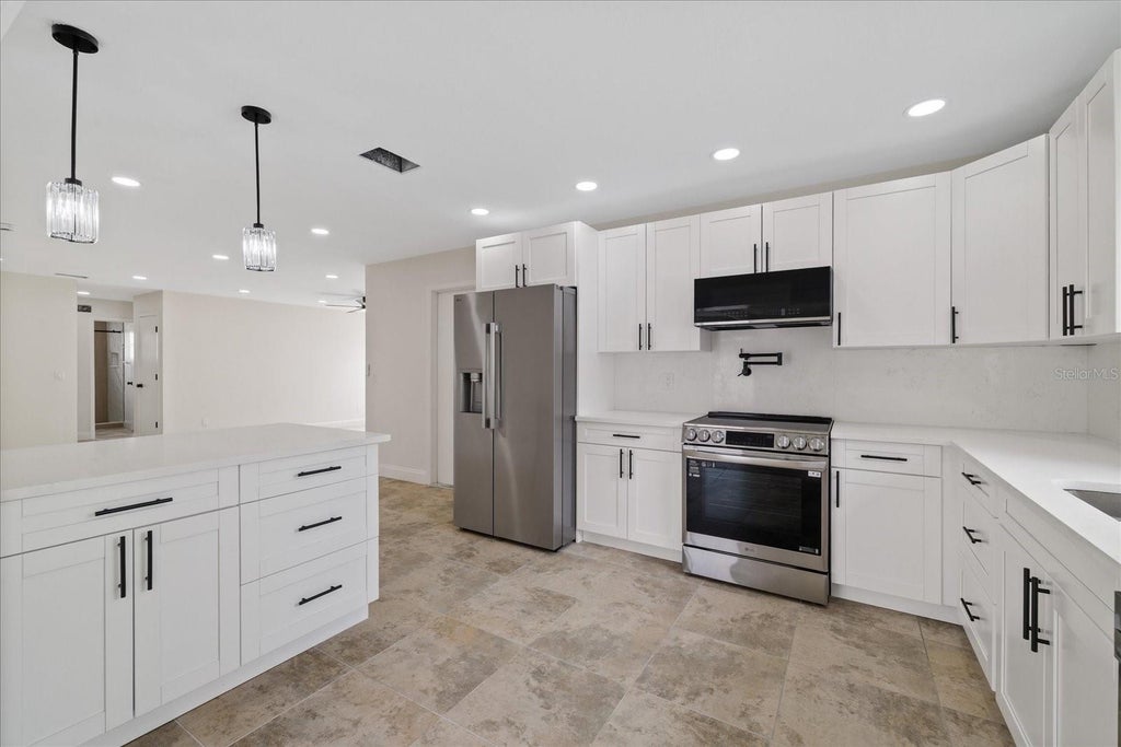Photo of 1016 Fuchsia Drive, Holiday, FL 34691 (MLS # TB8552589)