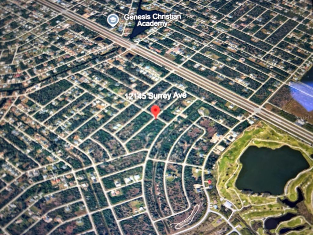 Photo of 12145 Surrey Ave, Port Charlotte, FL 33981 (MLS # C7521685)