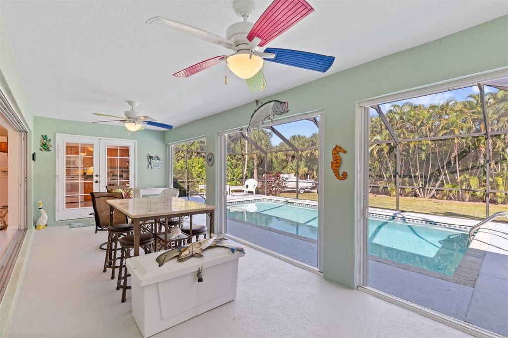 Photo of 7660 Grande Pine Road, Bokeelia, FL 33922 (MLS # TB8489367)