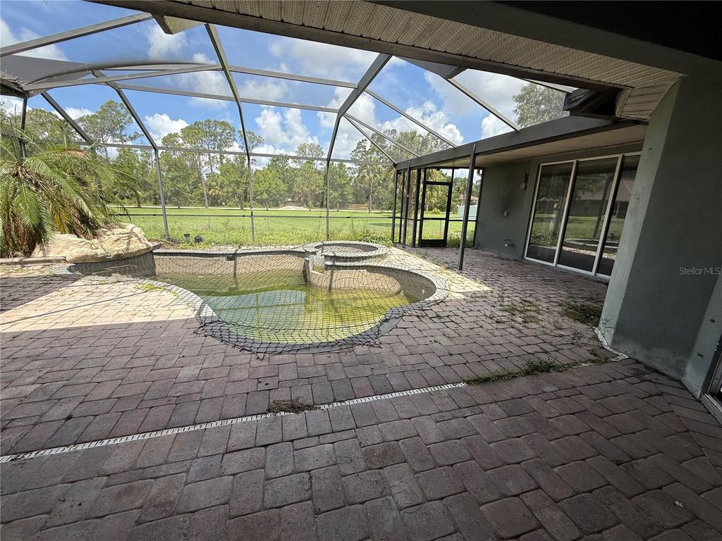 Photo of 2143 Santonian Terrace, North Port, FL 34286 (MLS # C7511192)