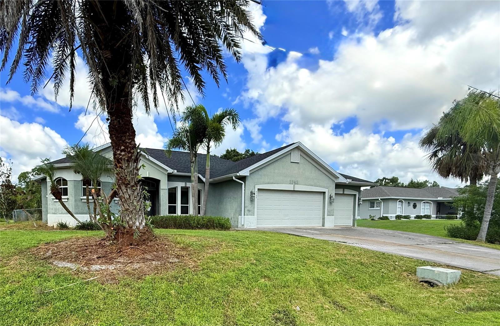 Spacious North Port Pool Home located off of Cranberry Blvd and close to everything North Port. Impressive features 2006 custom-built pool home nestled on a double lot in North Port. Boasting 2,484 square feet of living space, this residence features a well-designed floor plan with 4 bedrooms and 2.5 bathrooms. The three-car garage provides ample room for vehicles and even room for a workshop area. Recent updates ensure peace of mind, including a new roof in 2023 and an updated A/C system in 2018. This home offers an opportunity for a new owner to personalize and repair and enhance. One of this home's most significant assets is its prime location. Enjoy the convenience of being just a short distance from the elementary school, with easy access to the middle and high schools. Outdoor enthusiasts will love the proximity to the 42-acre Butler Park, which includes the Morgan Family Community Center, North Port Aquatic Center, ball fields, a canoe and kayak launch, and scenic walking paths. Explore Southwest Florida. Beyond North Port, you'll have all of Southwest Florida at your fingertips. Indulge in the Gulf beaches of Sarasota, Venice, Englewood, and Boca Grande, all just a short drive away. This home offers a fantastic blend of space, comfort, and an ideal location for anyone looking to enjoy the best of North Port and Southwest Florida. Ready to make it yours?