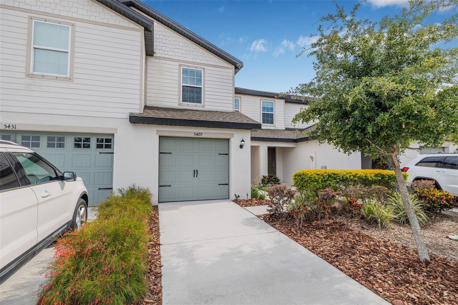Step into elevated living with this stunning 3-bedroom, 2.5-bathroom townhome, perfectly positioned in the desirable Madison Village community. Built in 2021 and showcasing the spacious Pensacola floor plan, this residence blends timeless design with contemporary comfort.
Backed by a tranquil open field, the home offers unmatched privacy and serene, uninterrupted views—whether you're enjoying your morning coffee, waking up to soft natural light, or washing dishes in the thoughtfully appointed kitchen. The screened-in porch invites quiet moments, while the nearby community playground adds a touch of charm and convenience.
Inside, you’ll find refined touches throughout: Whirlpool appliances, generous walk-in closets, and abundant storage space. The one-car garage adds both function and sophistication to your everyday lifestyle.
Experience the rare blend of peaceful surroundings and luxury finishes—welcome home.
Apply for this yearly rental here: https://apply.link/FCmD_WY