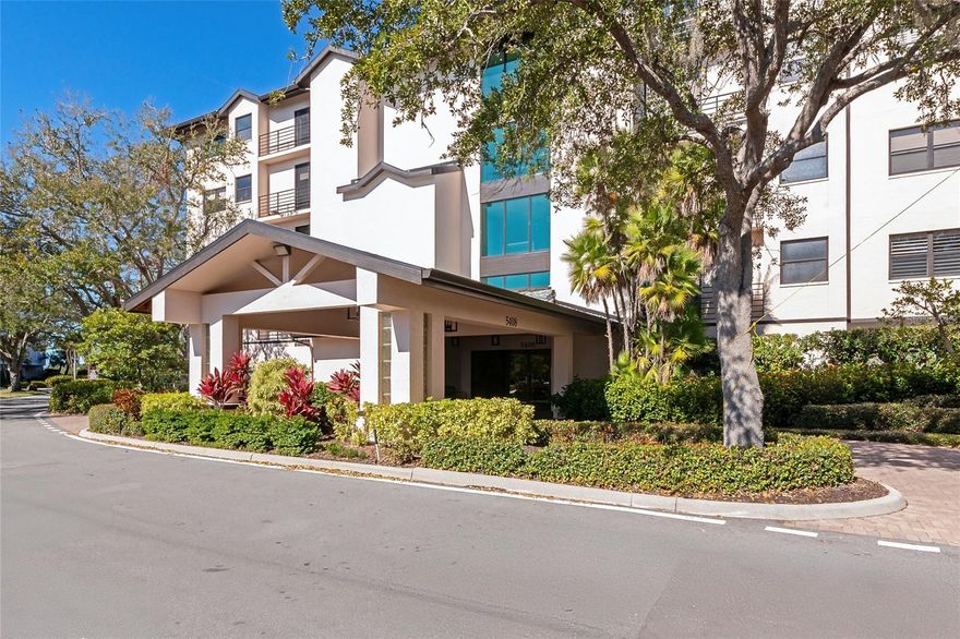 THIS IS THE LOWEST PRICE UNIT BY A STAGGERING $100,000, making it the clear standout for buyers who understand value.  BRING THE OFFERS. SELLER FINANCING AVAILABLE. Discover your slice of Sarasota paradise with panoramic Intracoastal Waterway views and unforgettable sunsets from every room of this beautifully updated third-floor condo in Eagles Point at The Landings, one of Sarasota’s most desirable West of Trail, gated communities, just minutes from world-famous Siesta Key Beach and downtown. This light-filled residence showcases brand-new, top-of-the-line impact windows and an expansive triple-glass impact sliding door, offering both peace of mind and stunning views over mangroves toward Siesta Key and the Gulf beyond. The building’s common areas have also been upgraded with impact windows for added security and value. Step inside to an inviting open-concept great room, ideal for entertaining. Features include luxury vinyl plank flooring, fresh neutral paint, and designer lighting throughout. The chef’s kitchen is a standout with quartz countertops, designer tile backsplash, newer stainless steel appliances, abundant cabinetry, and an oversized island with wine and beverage refrigerator, perfect for gatherings. Double glass doors lead to the spacious primary suite, complete with a private sitting or office niche, dual walk-in closets, and a spa-inspired bath featuring double vanities and a large walk-in shower. A generously sized guest bedroom and bath are thoughtfully positioned for privacy, with gulf-facing views sure to impress visitors. The sun-drenched flex space/sunroom off the kitchen offers the home’s best view and is ideal as a breakfast café, dining nook, or serene retreat. Additional highlights include a full indoor utility room, new washer & dryer (2021), new A/C with humidistat (2021), and water heater (2020). The unit includes under-building parking, extra storage locker, kayak or paddleboard storage, bike room access, and ample guest parking. Eagles Point residents enjoy a private pool and grill area, plus membership in The Landings Racquet Club, featuring Har-Tru tennis courts, pickleball, junior Olympic lap pool, spa, fitness center, library, and an active social calendar. Enjoy a waterfront lifestyle with mangrove-lined walking paths, fishing gazebo, kayak launch on the Intracoastal, and lush tropical surroundings, all just minutes from downtown Sarasota, fine dining, shopping, and cultural attractions. Luxury, location, and lifestyle converge here. Schedule your private showing today before this opportunity is gone!