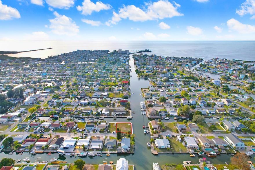 Welcome to a rare opportunity to own a double corner lot at the end of a cul-de-sac, situated along a serene main canal with direct Gulf access. This is a canvas awaiting your dream home vision. With a new seawall already in place, your waterfront living dreams are within immediate reach! Don't miss out on the chance to turn your dream home into a reality on this exceptional READY TO BUILD double corner lot. Seize the opportunity to live a life of luxury, relaxation, and endless waterfront adventures.