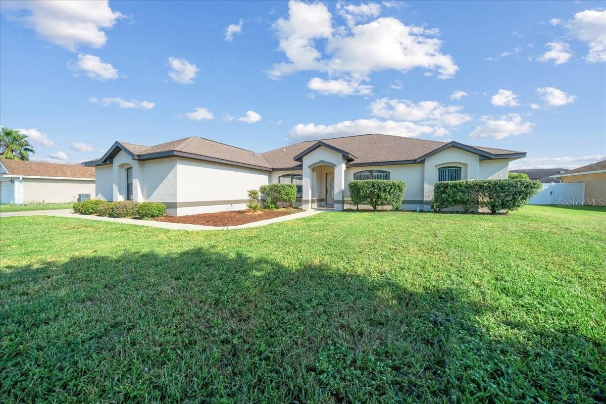 Welcome home to this newly renovated 4 bedroom 3 bathroom customized property with a side entry garage and over 3,000 square feet total. Renovations include: painted interior and exterior with trim, laminate flooring in bedrooms, quartz kitchen counters and breakfast bar, marble stone backsplash, updated mirrors and lighting fixtures. Eat-in Kitchen includes a breakfast nook, bay window, pantry along with new stainless steel range, microwave, and dishwasher. Owner's suite includes walk-in closet, two sinks/vanities, linen closet, shower, and whirlpool tub. Fourth bedroom has a private bathroom with separate entry/exit. Other features include security system, camera/doorbell, digital water heater with solar, and an inside laundry with a sink. Annual HOA cost is currently under $200.00! Vacant and move in ready. Enjoy nearby shopping centers, restaurants, and a library.
