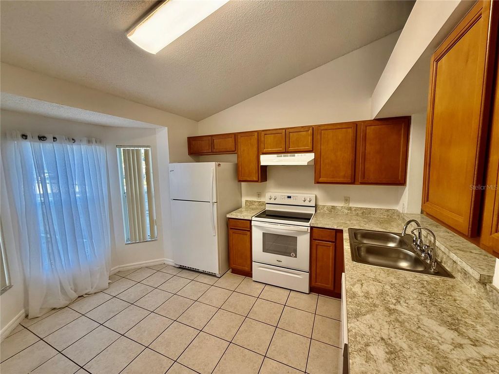 Photo of 1128 Jade East Lane, Kissimmee, FL 34744 (MLS # S5140138)