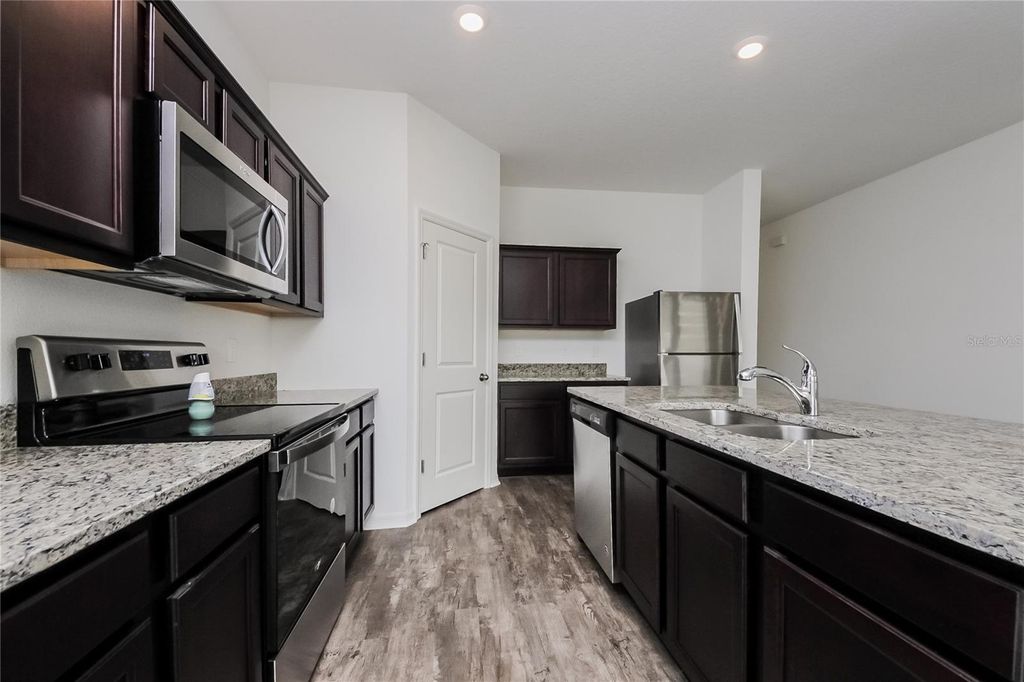 Photo of 126 Hidden Lake Loop, Haines City, FL 33844 (MLS # O6361223)