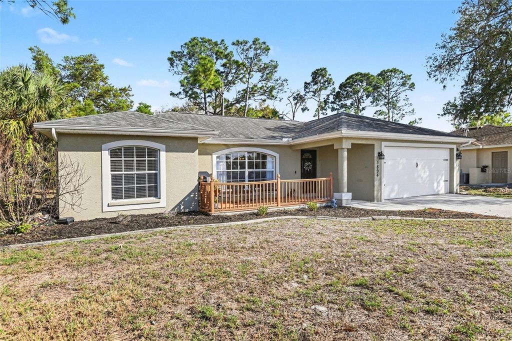 Photo of 3894 S Chamberlain Boulevard, North Port, FL 34286 (MLS # TB8493969)