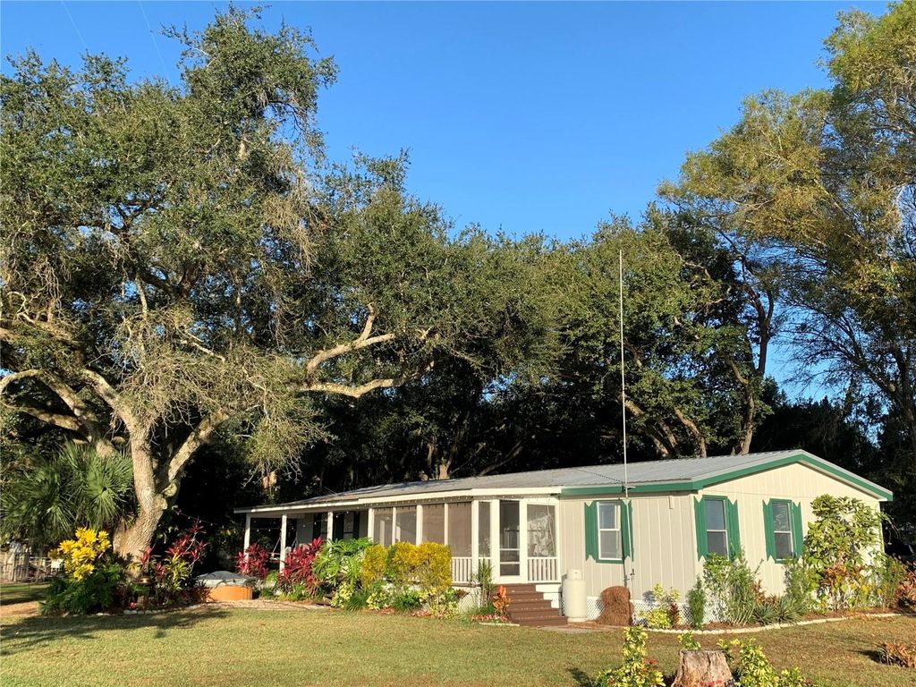 Photo of 1418 NW 141st Street, Okeechobee, FL 34972 (MLS # O6393993)