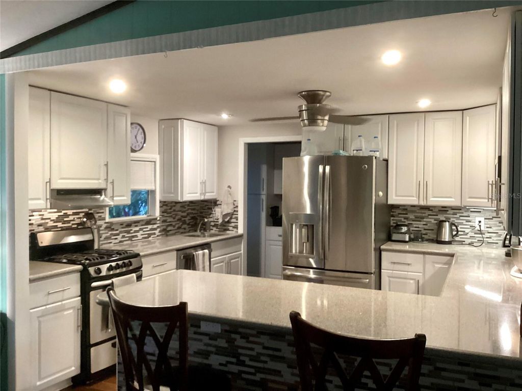 Photo of 1418 NW 141st Street, Okeechobee, FL 34972 (MLS # O6393993)