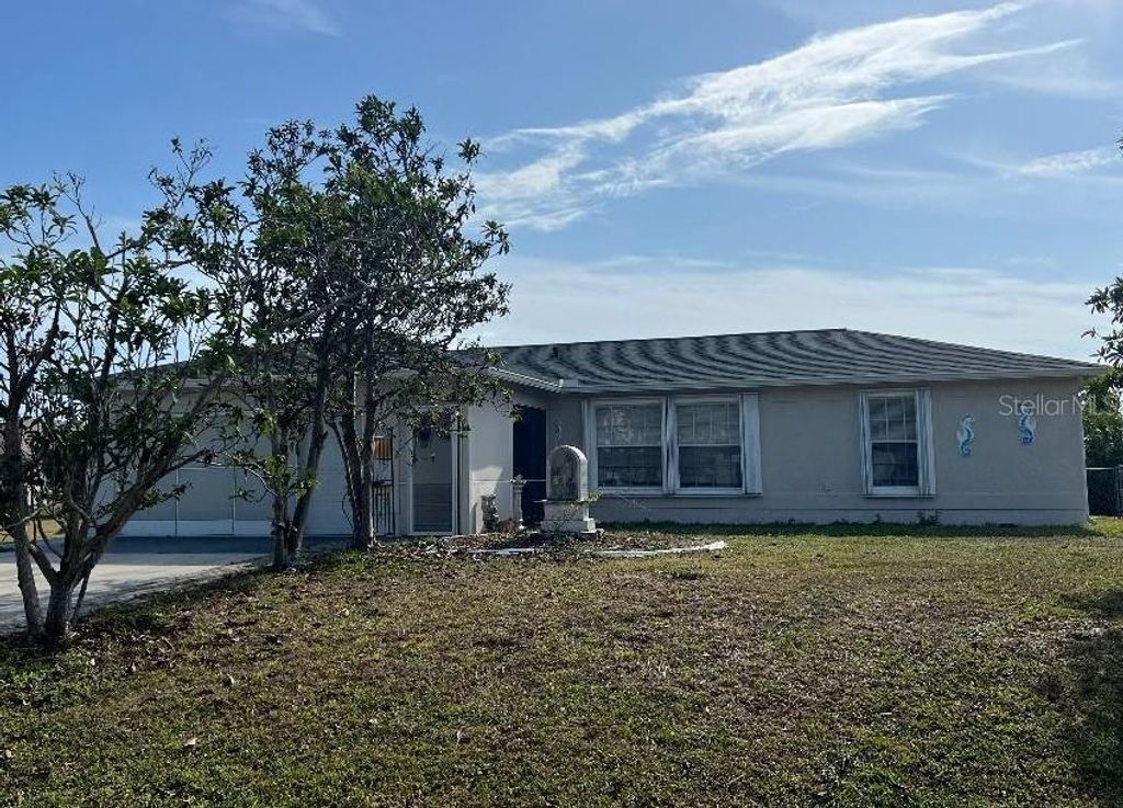 Photo of 12143 Du Barry Avenue, Port Charlotte, FL 33981 (MLS # C7516611)