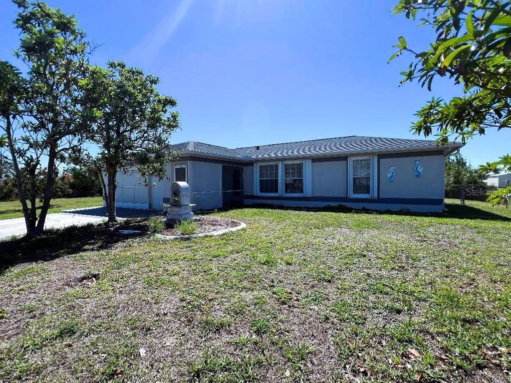 Photo of 12143 Du Barry Avenue, Port Charlotte, FL 33981 (MLS # C7516611)