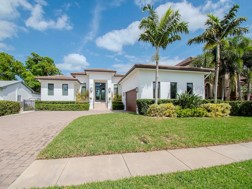 **Luxurious Contemporary Oasis on St. Petersburg's Prestigious Snell Isle**

Discover the pinnacle of modern elegance in this stunning one-story residence, meticulously crafted by Devonshire and ideally situated in the coveted enclave of Snell Isle. Perfectly positioned along the picturesque 4th hole of the Vinoy Resort and Golf Club, this architectural masterpiece offers unparalleled luxury and panoramic views of lush greenery.

Upon arrival, be captivated by the sleek lines and striking facade of this contemporary marvel. Step inside to be greeted by soaring 12-foot ceilings in the main living areas, creating an atmosphere of grandeur and spaciousness, while 10-foot ceilings in the bedrooms enhance comfort and intimacy.

Designed for seamless indoor-outdoor living, the home boasts custom features throughout, seamlessly blending style and functionality. A harmonious fusion of form and function, the residence encompasses four bedrooms, each with its own private ensuite bathroom, providing the utmost in comfort and privacy for family and guests.

The stunning chef kitchen is set central in the home with stainless appliances, beverage fridge, custom cabinetry and walk-in pantry.

Indulge in the epitome of relaxation and entertainment in the expansive living spaces, where walls of glass frame breathtaking views of the meticulously landscaped grounds and championship golf course beyond. The gourmet kitchen is a chef's dream, appointed with top-of-the-line appliances, sleek cabinetry, and a center island, ideal for culinary creations and casual gatherings alike.

Escape to the luxurious master suite, complete with a spa-like ensuite bath, large walk in closets with custom built ins and private access to the outdoor oasis. Here, a tranquil retreat awaits, 
featuring a sparkling pool and spa surrounded by lush tropical foliage, creating an idyllic setting for al fresco dining, sun-drenched lounging, and starlit soirées.

Additional highlights of this exceptional residence includes a custom blind, surround sound, custom built ins, spacious laundry room, convenient mudroom, full house generator, and a two-car garage with epoxy floors and ample storage space, ensuring both style and functionality at every turn.

Located in the prestigious community of Snell Isle, residents enjoy the epitome of luxury living with access to world-class amenities, including golf, tennis, boating, and fine dining, all just moments from downtown St. Petersburg's vibrant cultural scene and pristine Gulf beaches.

Don't miss your opportunity to experience the ultimate in contemporary luxury living. Schedule your private tour today and elevate your lifestyle to new heights on Snell Isle.