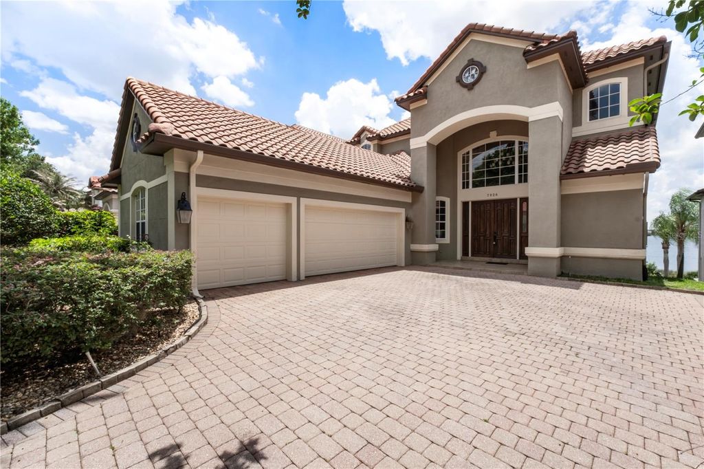 Photo of 7926 Versilia Drive, Orlando, FL 32836 (MLS # O6410270)