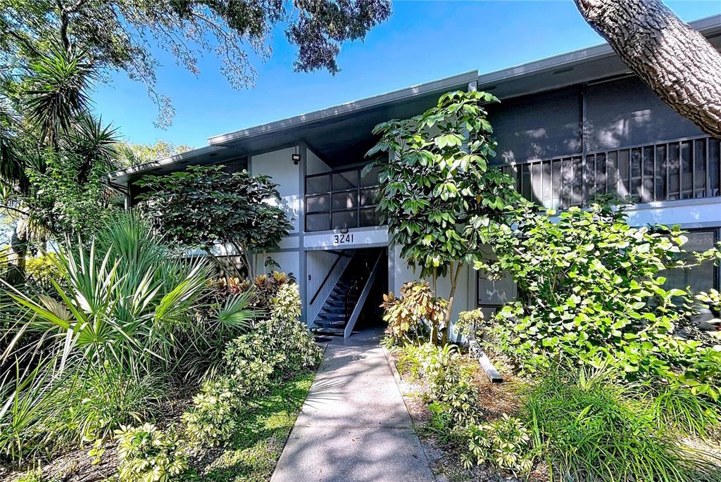 Photo of 3241 Fox Chase Circle N #103, Palm Harbor, FL 34683 (MLS # TB8441653)