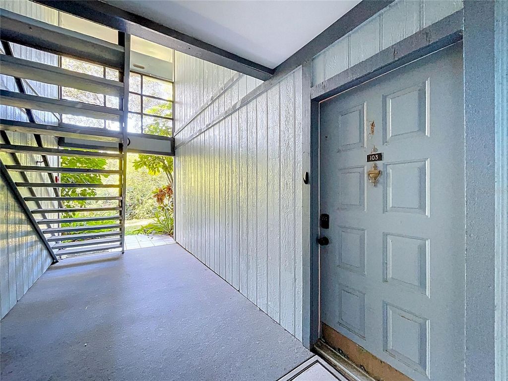 Photo of 3241 Fox Chase Circle N #103, Palm Harbor, FL 34683 (MLS # TB8441653)