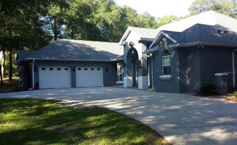 Photo of 230 Horizon Ridge Drive, Orange City, FL 32763 (MLS # V4948412)
